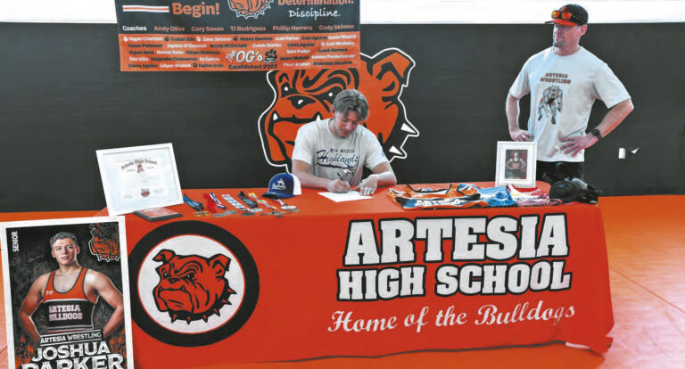 AHS wrestler signs letter of intent
