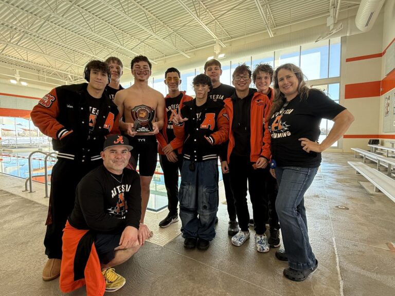 “Water Dog” coach passed baton to Andrea Ciro, as team looks to make splash at state swim meet