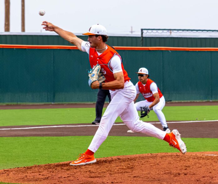 Artesia pitcher Jack Byers throws a strike against Goddard in a district game.