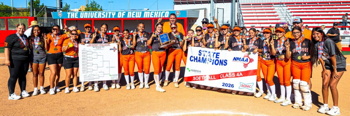 The Artesia softball team holds the blue trophy after beating Aztec on Saturday in the Class 4A championship game.