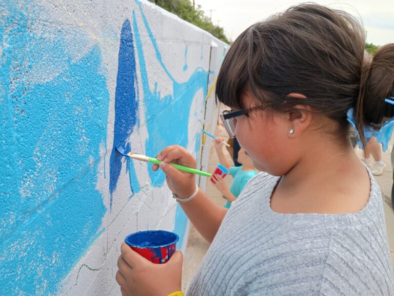 Artesia school children paint part two of Eagle Draw Mural. Here are some pictures and some details.