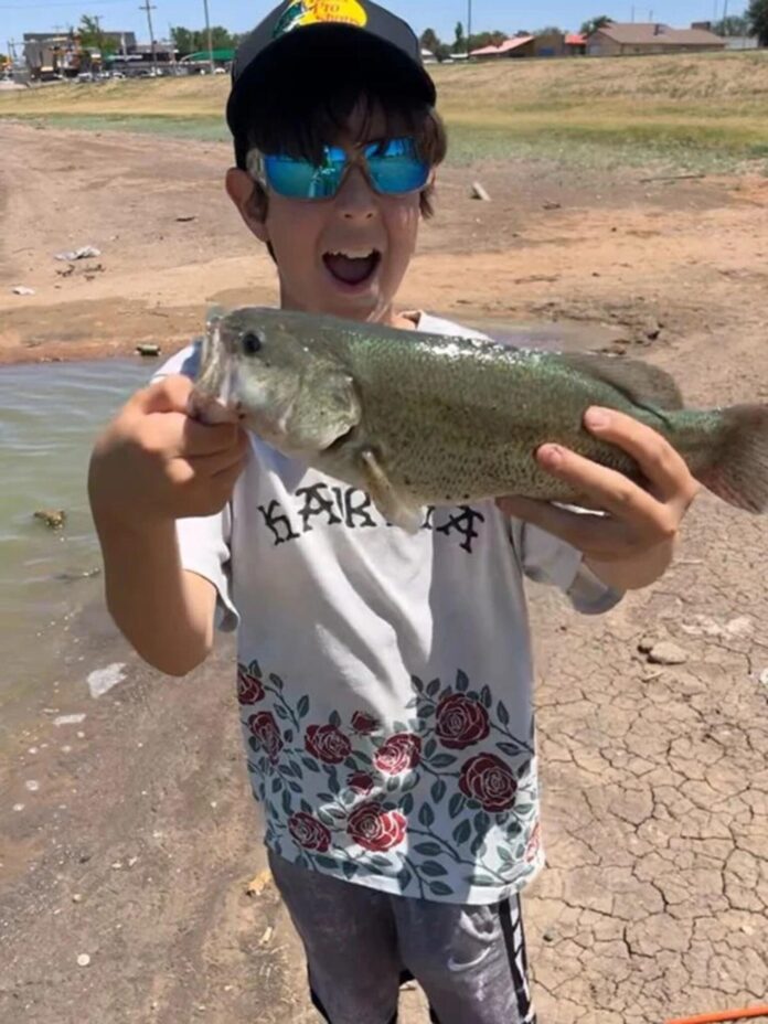 Mavrick caught this bass using a Tequila Sunrise Berkley Power Worm on a jig head on May 16, 2026 at Greene Acres Lake.