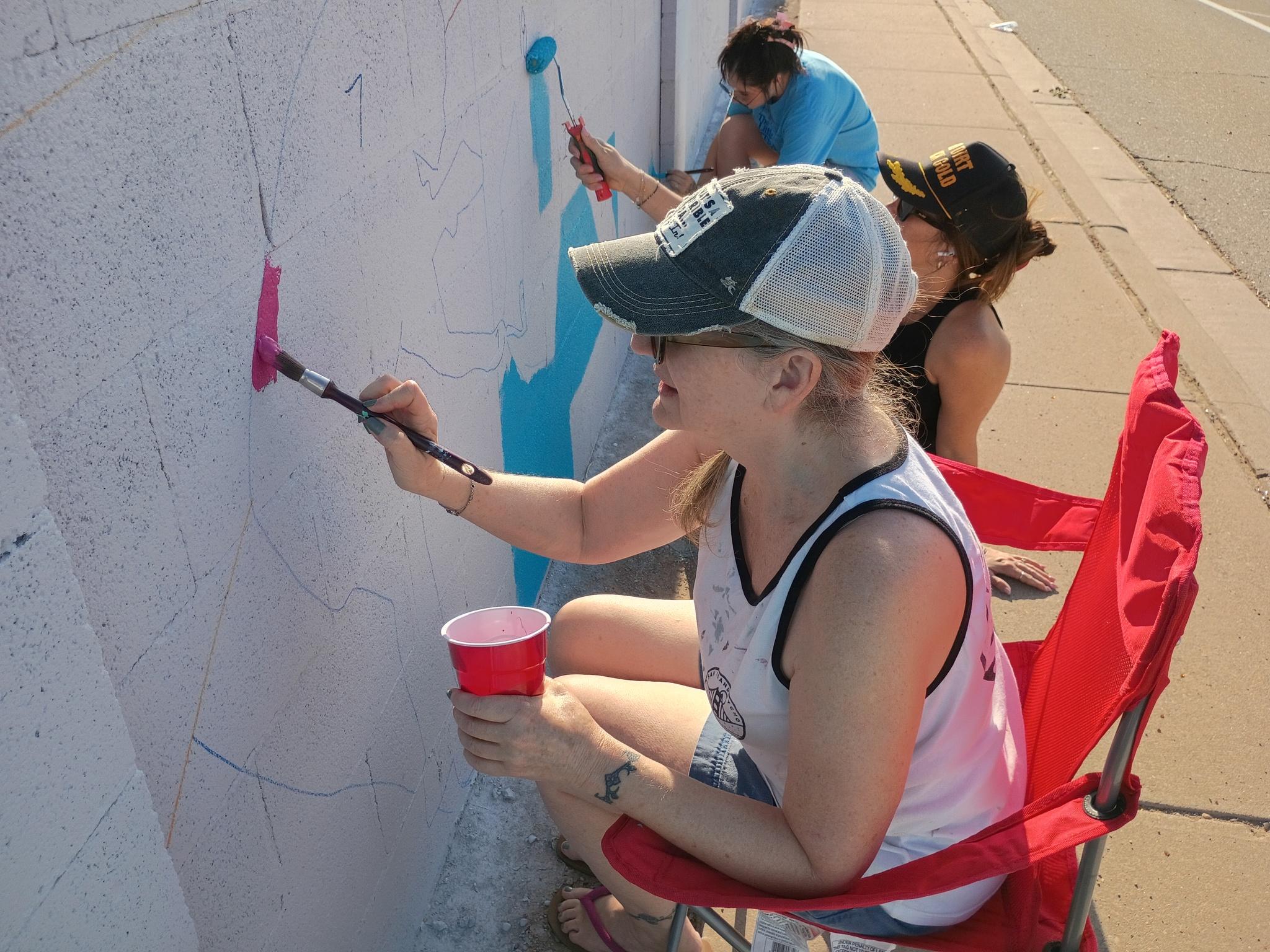Brushstrokes of progress. Another mural is being painted in Artesia across the street from Eagle Draw. Here’s how you join the community wide painting