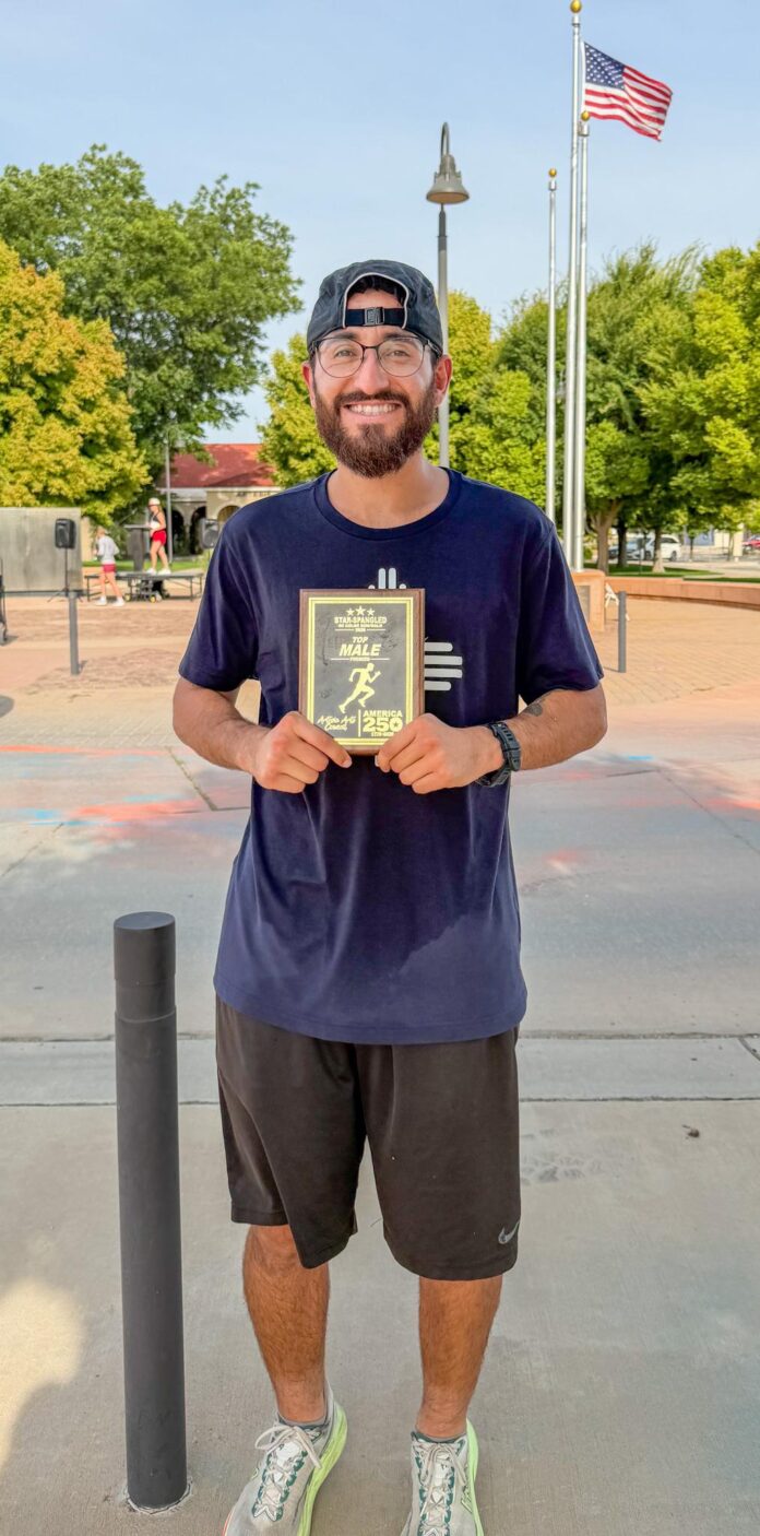 Artesia’s new cross country coach Julius Acosta after running a race this summer.