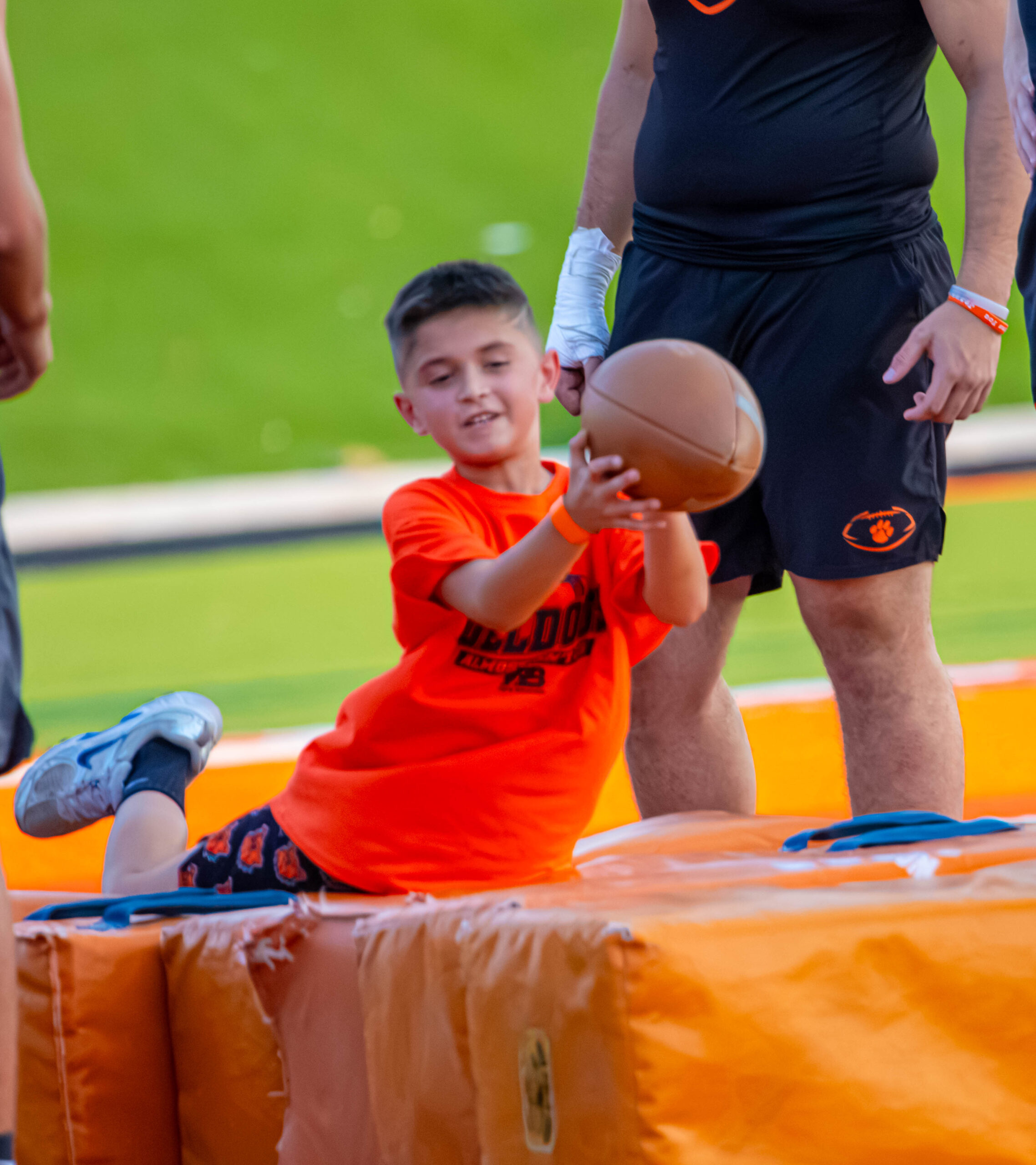 Scenes from Artesia kids’ football camp