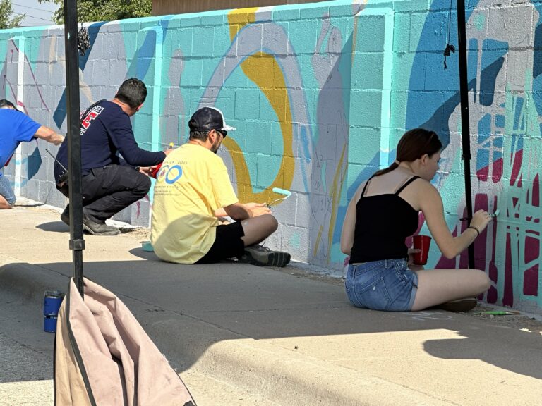Mayor, firefighters’ brave late morning heat for mural painting Friday. Here is a photographic update