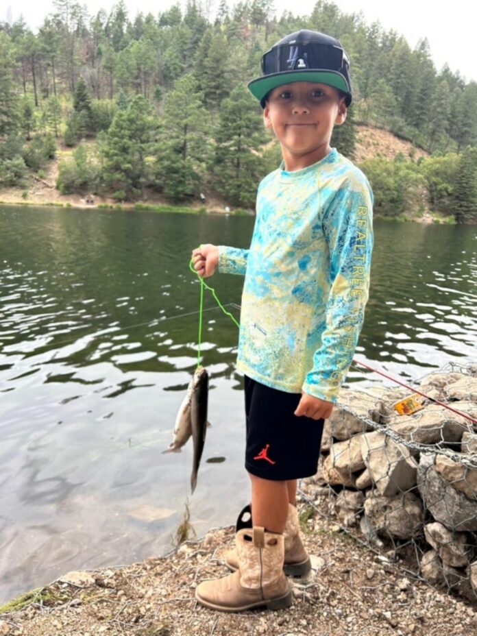 Bubba Olivas had a fun day fishing and caught four trout using nightcrawlers at Bonito Lake.