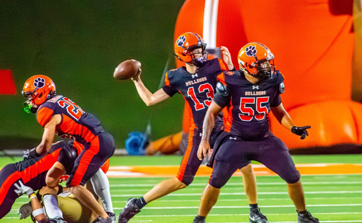 Artesia quarterback Lucas Atkins throws a pass during a game against Gadsden on Friday at the Bulldog Bowl.