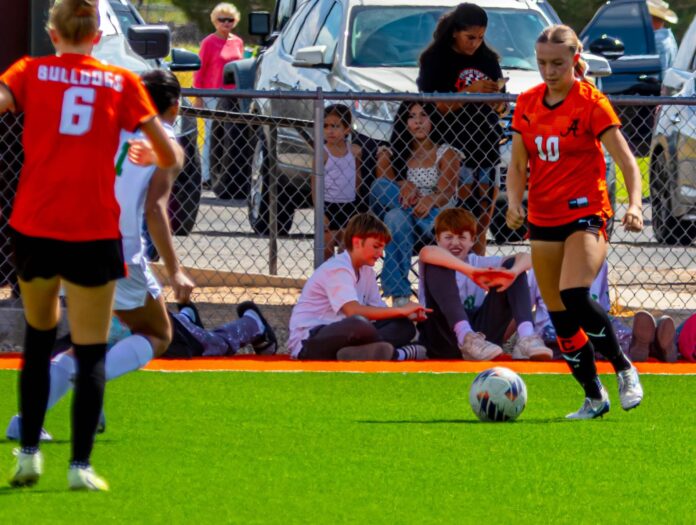 Abigail Jowers looks to make a pass against Moriarty during Senior Day on Saturday at Robert Chase Field.