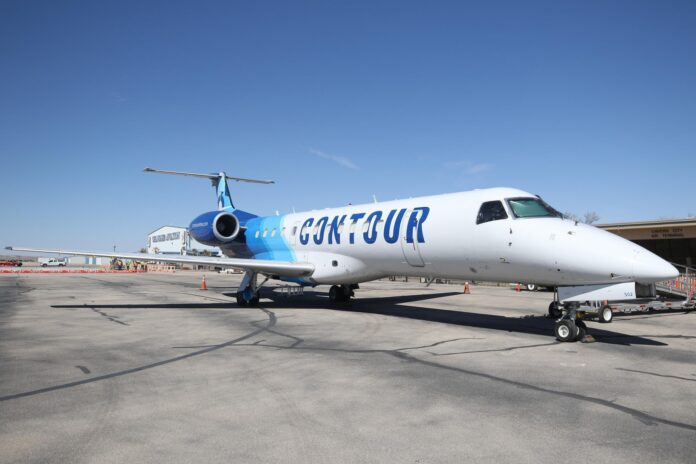 A Contour Airlines jet taxis at the Cavern City Air Terminal.
