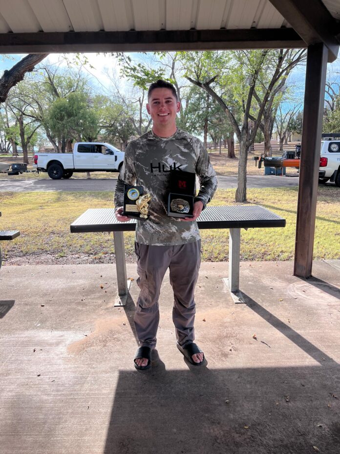 Noah Hoffman shows off his trophies at the New Mexico Bass Nation Kayak Anglers Classic Championship on Sept. 27, 2026 at Conchas Lake.