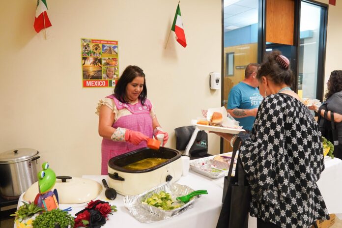 An attendee is served authentic Mexican foo at Taste of Culture.