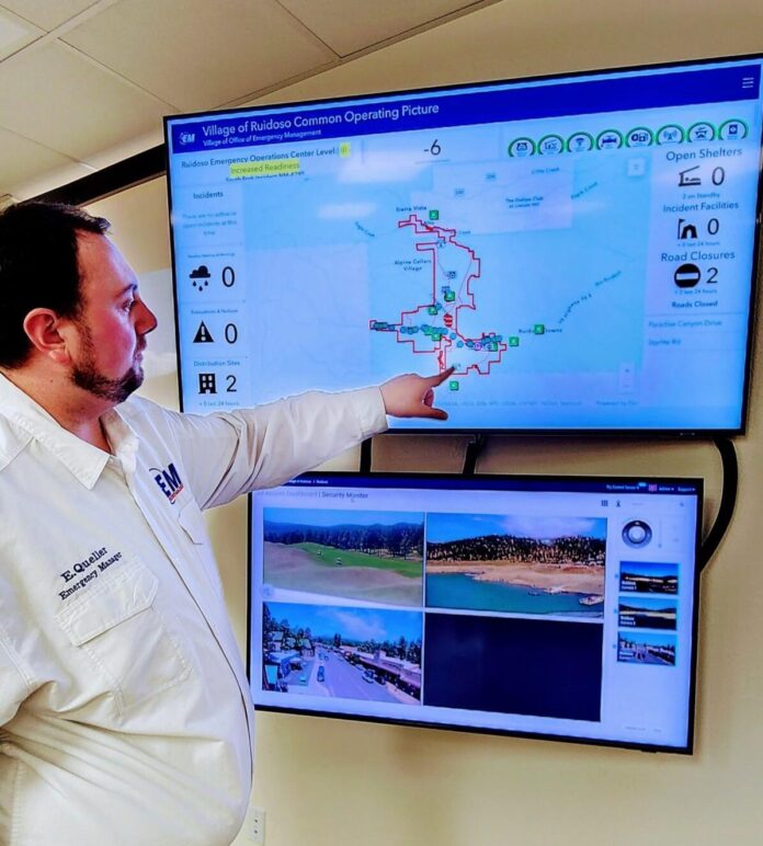 Eric Queller, Village of Ruidoso Director of Emergency Management, demonstrates the equipment used to help stay prepared during monsoon season at the emergency operations center.