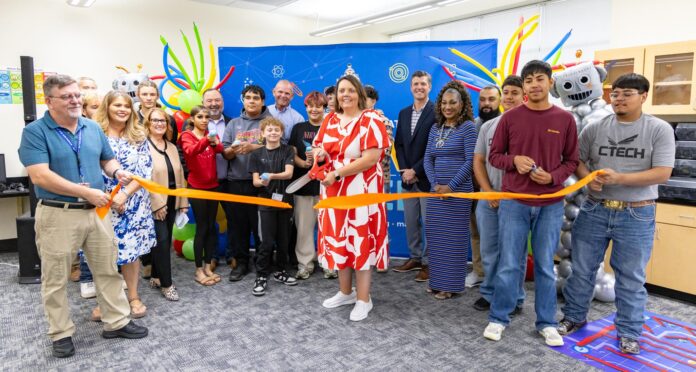 A ribbon cutting is held at the Cal Ripken Sr. Foundation STEM lab at Hobbs Alternative Learning Center.