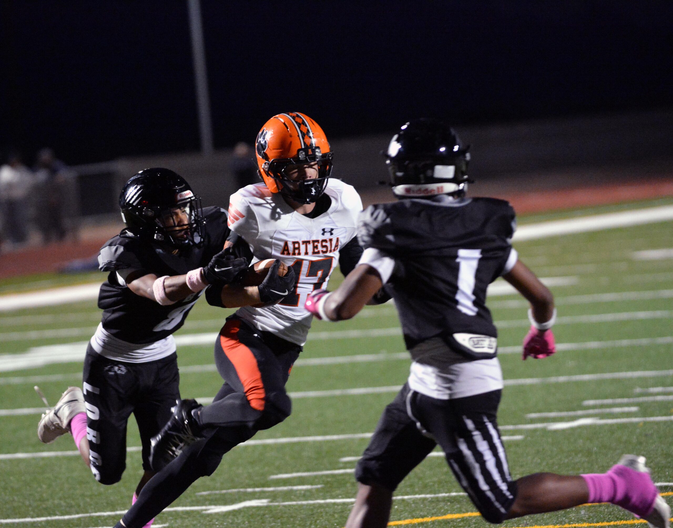 Scenes from the Artesia football game against the Chaparral Lobos